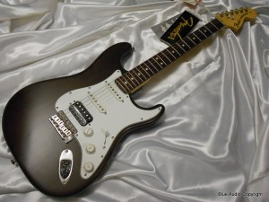 FENDER Chitarra Elettrica mod.Stratocaster HIGHWAY ONE HSS (USA)  RW Cocoa Trasparent